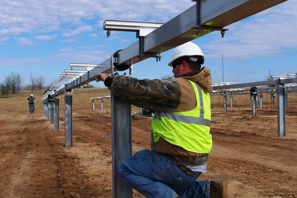 Lightwave Employees Doing Maintenance and Repairs on Solar Installation