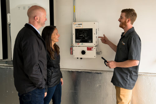 LightWave Employee Showing Homeowners to use Solar Battery Storage