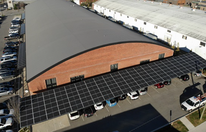 The Oak Barrel building in Nashville offers employees and guests solar-powered EV charging. Project built by LightWave Solar.